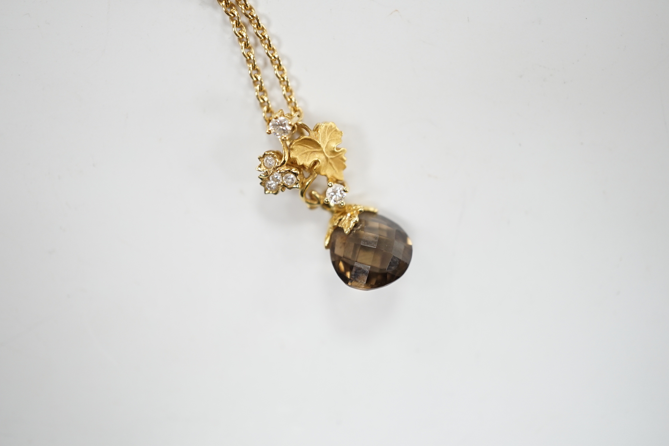 A modern Carera Y Carera 750 yellow metal, smoky quartz and diamond set drop pendant necklace, overall 46cm, gross weight 6.4 grams.